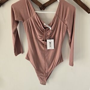Chic Dusty Pink Long Sleeve Bodysuit
